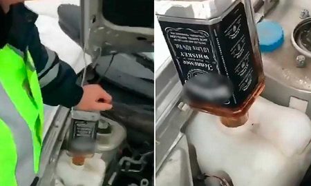 Видео: сотрудник ДПС, залил в машину виски вместо "незамерзайки"