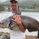 Рыболов поймал рекордного голубого сома на 900 граммового сомика